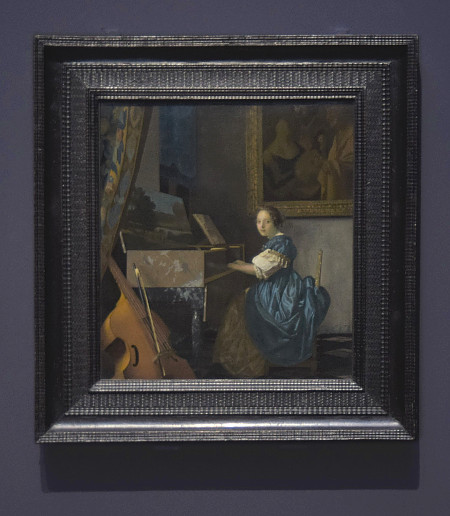 Johannes Vermeer's A Lady Seated at a Virginals with frame