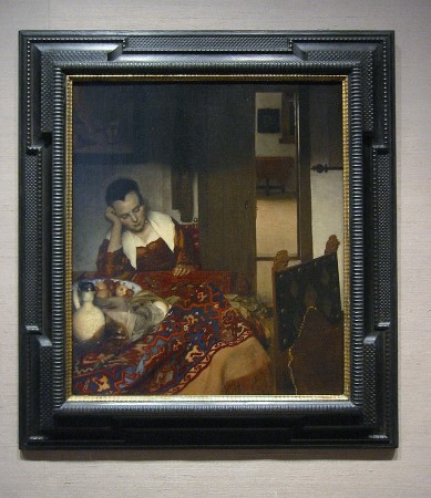 Johannes Vermeer's A Maid Asleep with frame