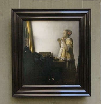 Johannes Vermeer's WOman with a Pearl Necklace with frame