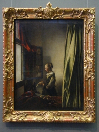 Johannes Vermeer's Girl Reading a Letter at an Open Window with its frame