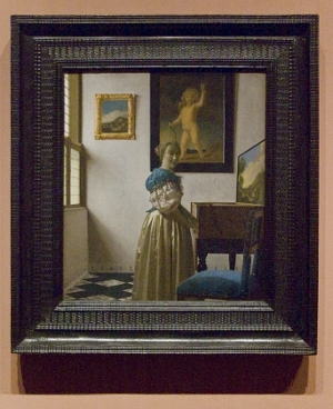 Johannes Vermeer's A Lady Standing at a Virginal with frame