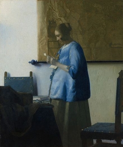 Woman in Blue Reading a Letter