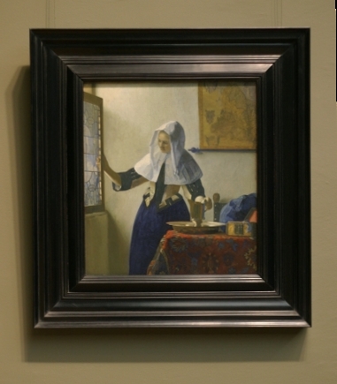 Woman Holding a Water Pitcher, Johannes Vermeer