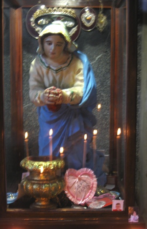 A twentieth-century commemorative statue of Saint Praxedis in the Roman Basilica of Santa Prassede