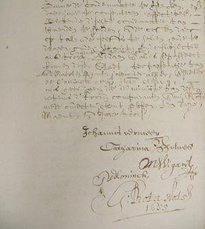 Archival record of declaration concerning Johan van Santen with the signatures of Vermeer and his wife Catharina Bolnes