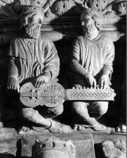 Elders playing an organistrum