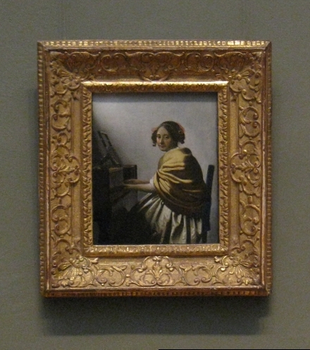 A Young Woman Seated at the Vriginals, Attributed to Johannes Vermeer