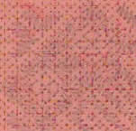 A detail of a pricking card with the holes forming the pattern.