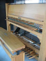 A modern baton keyboard with a Flemish pedal system