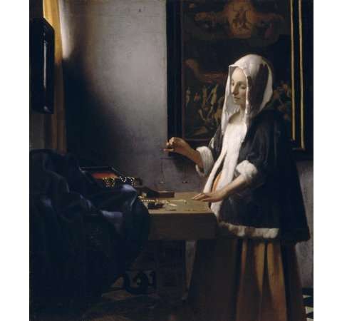 Woman Holding a Balance